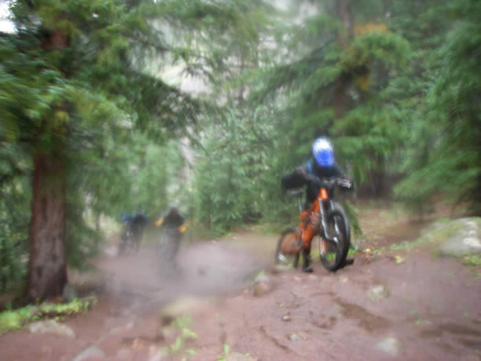Muddy hike-a-bike, Steve's waterproof camera now also covered in mud